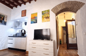 Chalet adosado en Vejer Zona cocina y television