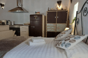 Chalet adosado en Vejer Cama y cocina